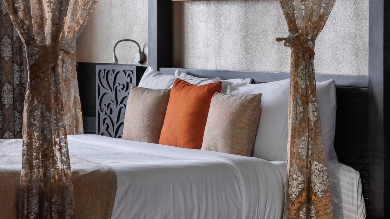 The Panoramic Getaway Hotel Munnar Exterior foto A bed with cushions