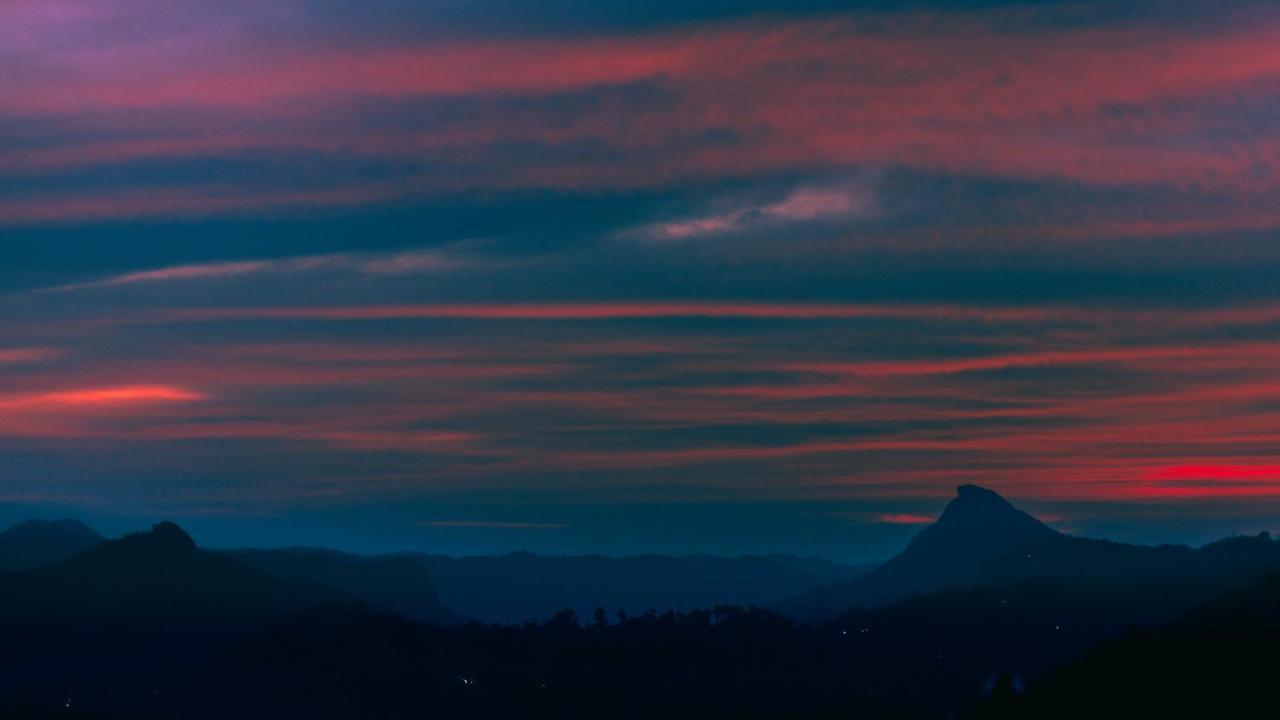 The Panoramic Getaway Hotel Munnar Exterior foto Sunset over the Sierra de los Caracoles