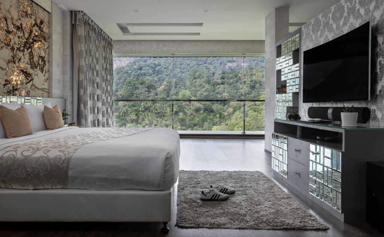 The Panoramic Getaway Hotel Munnar Exterior foto A bedroom at the hotel