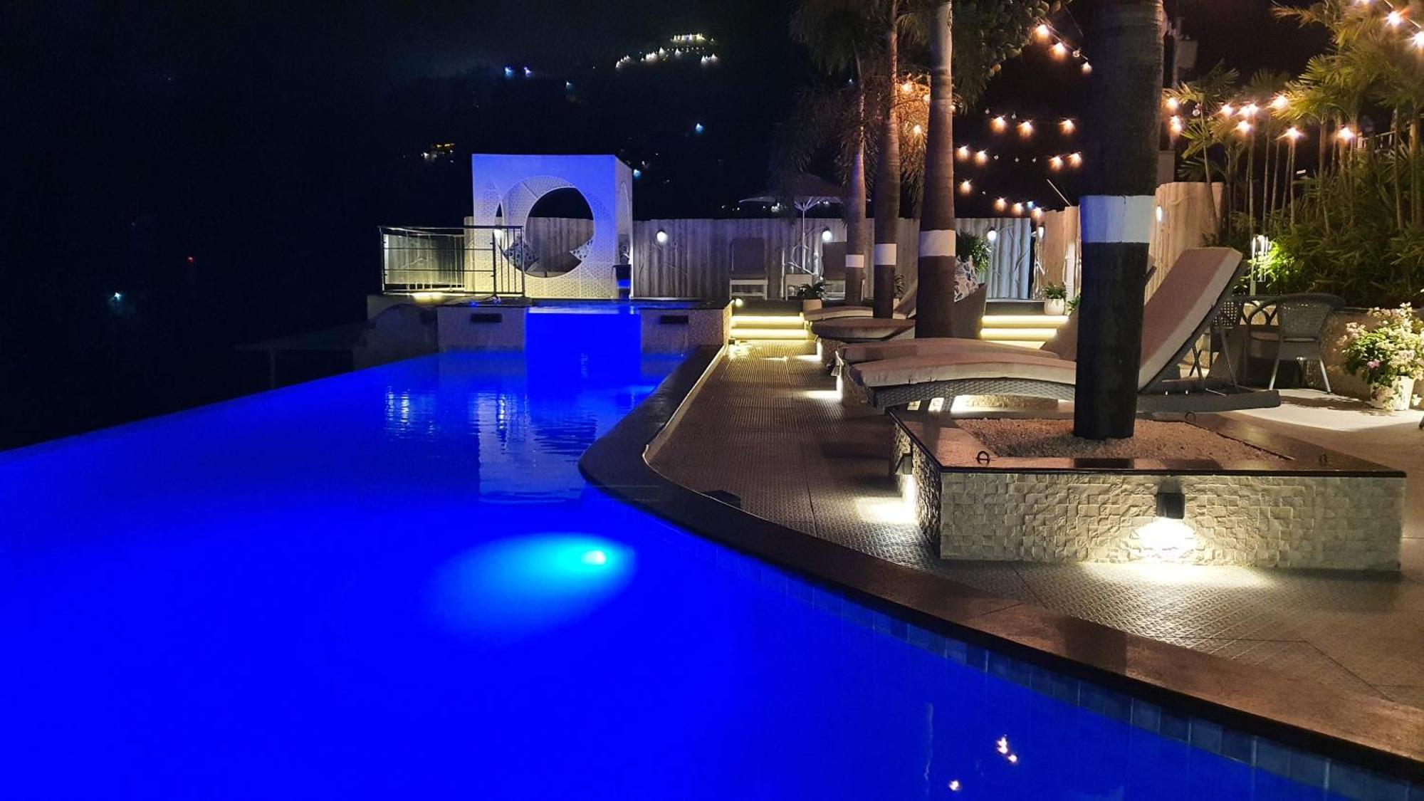 The Panoramic Getaway Hotel Munnar Exterior foto The pool at the hotel