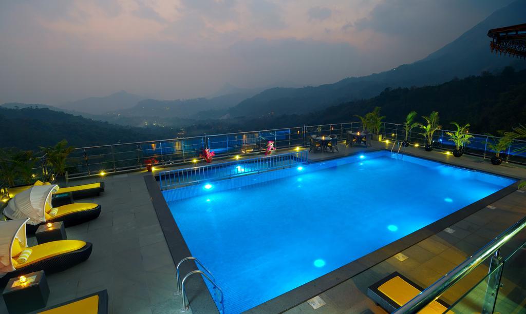 The Panoramic Getaway Hotel Munnar Exterior foto The swimming pool at the resort
